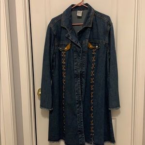 Boutique jean jacket duster with leather accents.